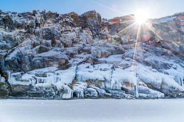 Frozen rock island with icicles in Lake Baikal — Stock Photo, Image