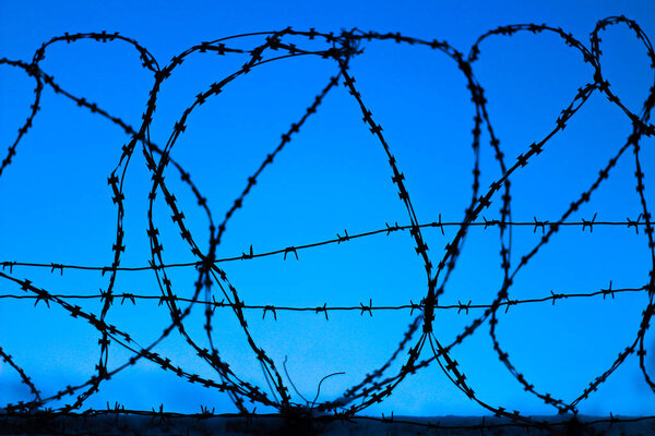 fence with barbed wire