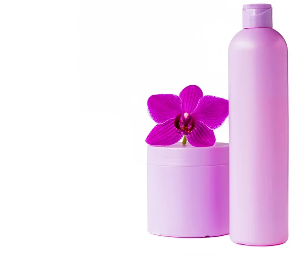 Behälter für Kosmetika mit Orchideen — Stockfoto