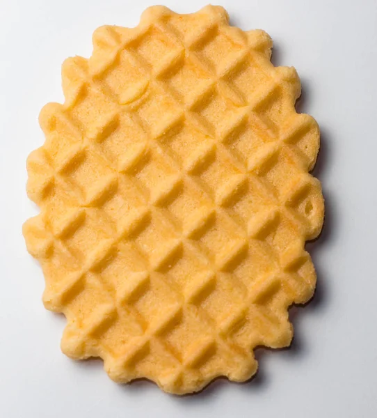 Französische Waffel auf weißem Hintergrund. Nahaufnahme — Stockfoto