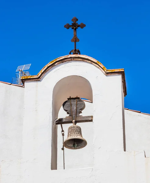 The bell of a small chapel church. Church-chapel in the city of Tossa.
