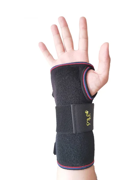 Black wrist splint for right hand male model. — Stock Photo, Image