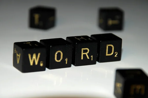 Bloques de madera con palabra "WORD" en blanco reflejando bajo tierra — Foto de Stock