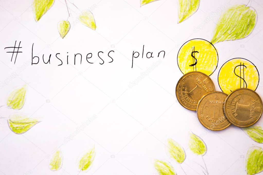 Business plan inscription with coins