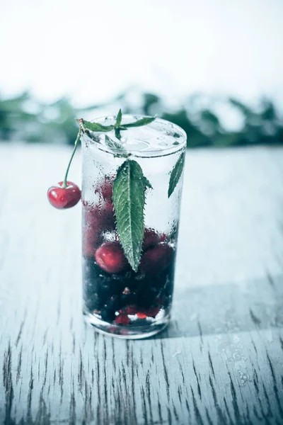 Summer cooling drink with fruit and ice.