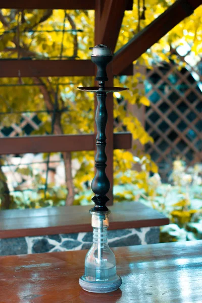 Hookah on a summer terrace with a blurred background. — Stock Photo, Image