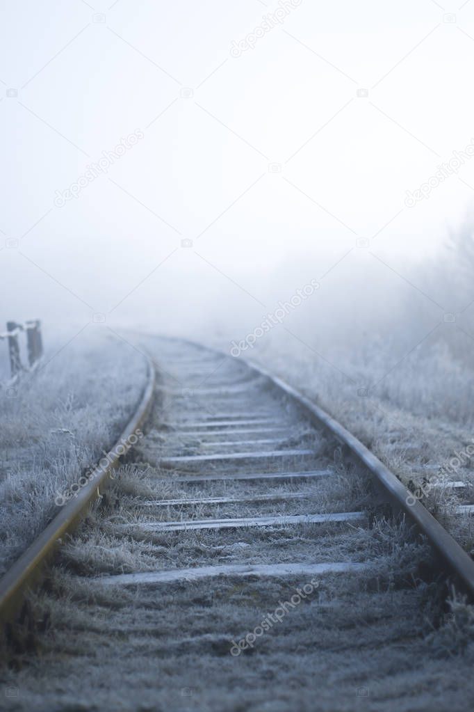 Winter landscape. Railway on a frosty morning.