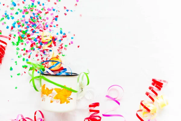 Confetti on a white background. Concept of the holiday. — Stock Photo, Image