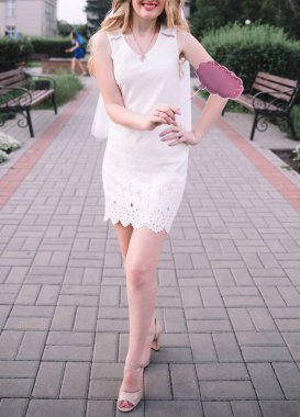 Girl bride with a sign in his hands in the park at a bachelorette party