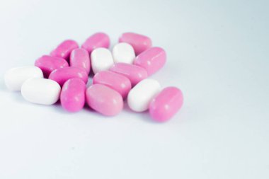 Pills multi-colored macro. Coronavirus vaccine concept. Healthcare