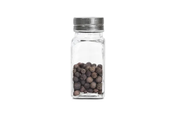 Botella de vidrio con guisantes pimienta — Foto de Stock