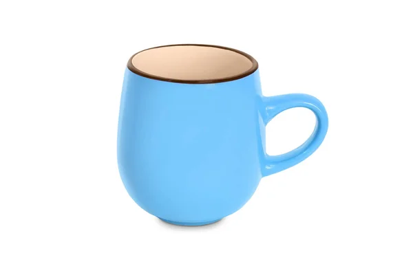 Чашка синего цвета на белом фоне — стоковое фото
