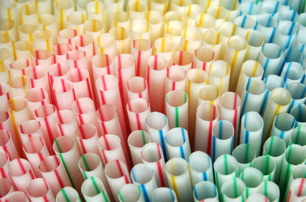 many colorful plastic straws
