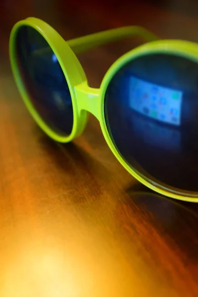 Sunglasses with reflection of screen — Stock Photo, Image