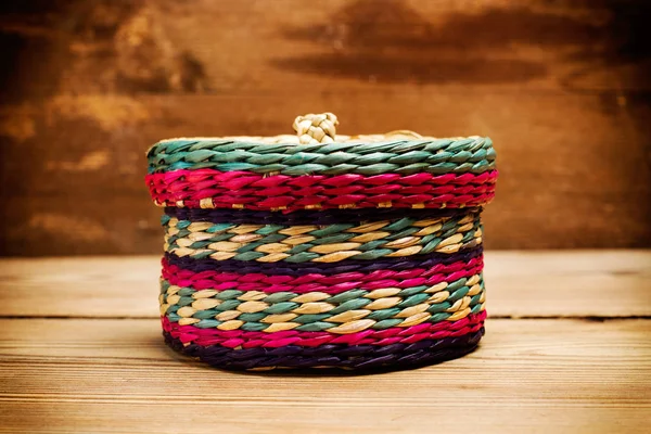 A colored wicker box