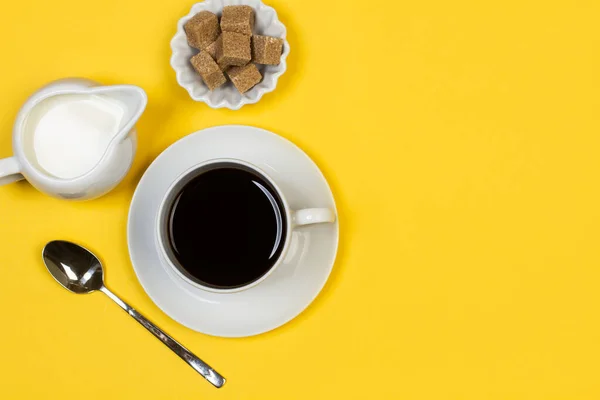 Cup Coffee Milk Maid Brown Sugar Cubes Yellow Background — Stock Photo, Image