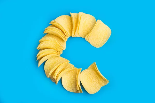 Lot Potatoes Chips Line Blue Background — Stock Photo, Image