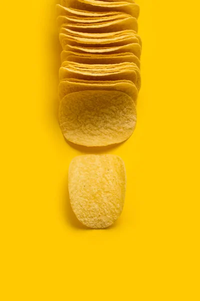 Lot Potatoes Chips Line Yellow Background — Stock Photo, Image