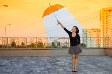 Global warming woman holding an umbrella is in a comfortable cli clipart