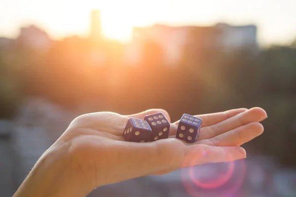 Cubes with number 6 in hand sunset background — Stock Photo, Image