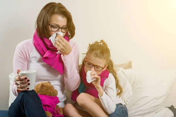 Flu season, sick mother and child at home. — Stock Photo, Image