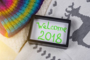 Hoşgeldiniz 2018. Noel giyim tarzı örgü arka plan kış giysileri