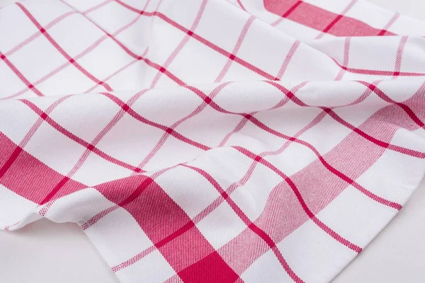 Ürün için arka plan. Ekose desenli masa örtüsü kırmızı ve beyaz kafese dokulu yüzeyi, yukarıdan görüntülemek.