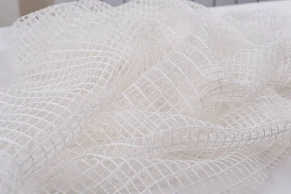 Malha de tecido é um branco, textura, fundo, padrão . — Fotografia de Stock