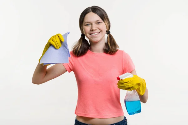 Cleaning day, spring cleaning. Girl teenager in protective gloves. — Stock Photo, Image