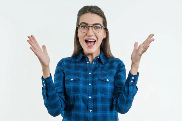 Excited woman with glasses. raises hands with enjoyment — Stock Photo, Image