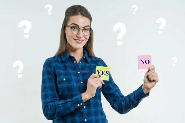 A Young attractive female thinking yes or no — Stock Photo, Image