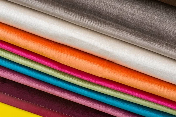 Samples of colorful interior fabrics. Book of fabrics for curtains, upholstery. — Stock Photo, Image