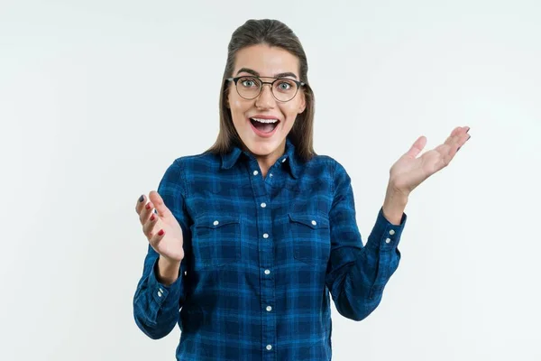 Surprised young woman in glasses over white background. — Stock Photo, Image