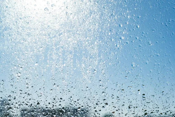 Rain Drops Window Background Blue Sunny Sky Drops Shine Sun — Stock Photo, Image