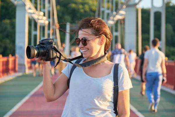 Mature woman photographing with camera, photo journalist, travel blogger — Stock Photo, Image