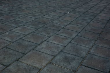 Bir şehir sokağının kaldırımlarının taşları.