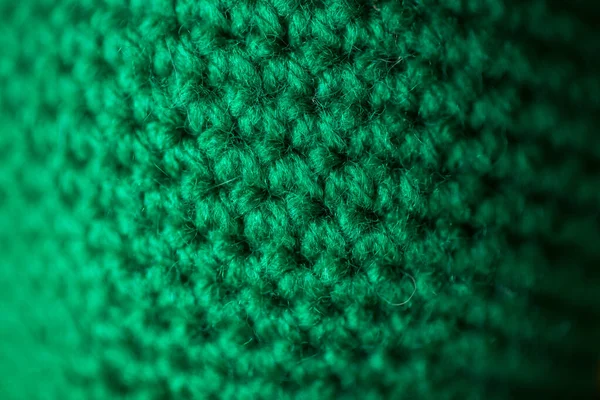 緑のニットウールのテクスチャは背景として使用できます. — ストック写真
