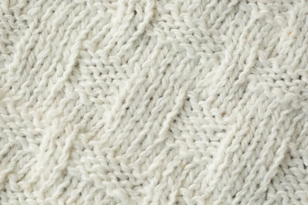 Knit texture of white wool knitted fabric with cable pattern as background. — Stock Photo, Image