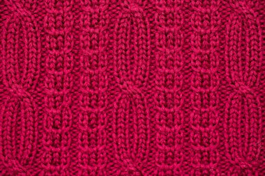Örgü kumaş arka planının dokusu. Örgü süs..