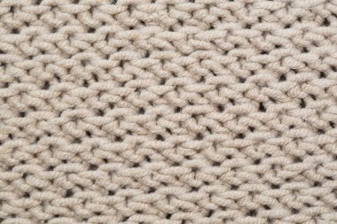 Örgü kumaş arka planının dokusu. Süs.