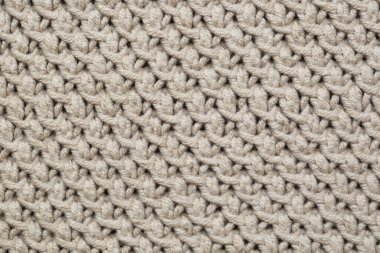 Örgü kumaş arka planının dokusu. Süs.