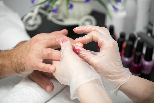 Manicure, Hands spa Cuticle oil. Beautiful man hands closeup. Manicured nails. Beauty hands. Beauty treatment