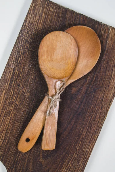 Wooden Ladles Dark Wooden Cutting Board — Stock Photo, Image