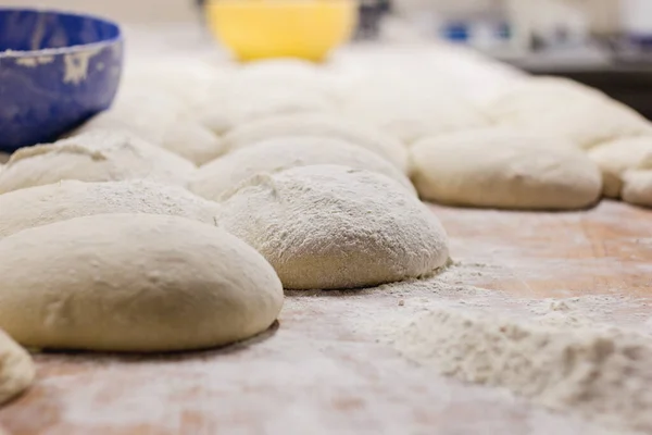 Photo of a fresh dough in a bakery