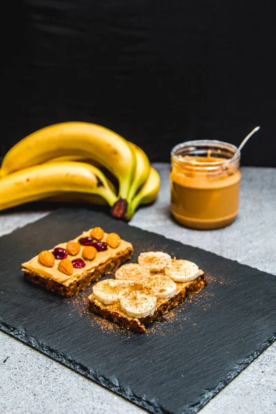 Healthy Breakfast Fitness Bread Peanut Butter Nuts Bananas — Stock Photo, Image