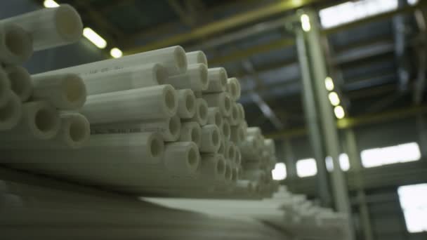 Polyethylene pipes in production factory storehouse — Stock Footage Polyethylene pipes in production factory storehouse Royalty Free Stock Footage