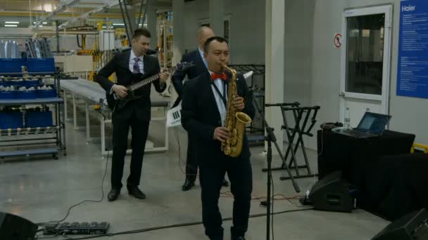 Musicians in suits playing musical instruments — Stock Video