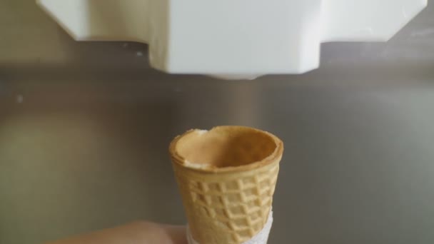 Ice cream filling waffle cone — Stock Video