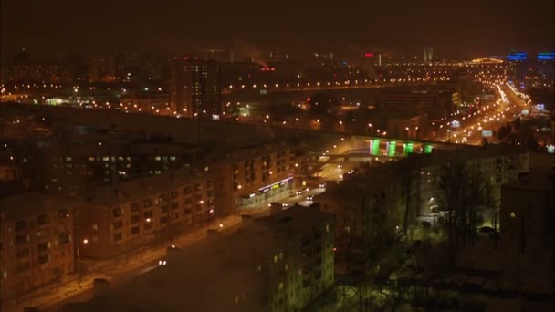 Night avenue among large modern city — Stock Video