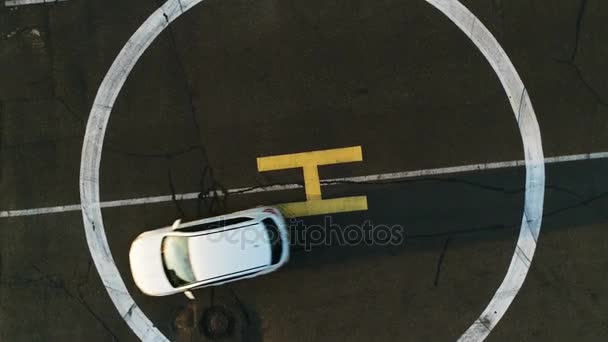 Drone Moves Rotates Helicopter Landing Pad Road Driving Lorries Warehouses — Stock Video